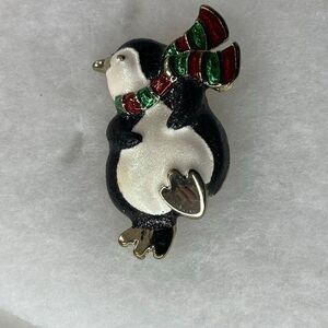 Vintage frosted penguin TC brand brooch.